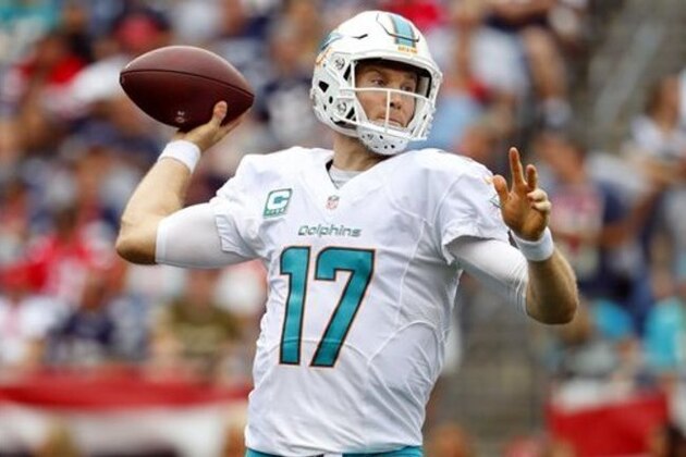 Miami Dolphins quarterback Ryan Tannehill throws during a NFL football game against the New England Patriots at Gillette Stadium in Foxborough, Mass. Sunday, Sept. 18, 2016. (Winslow Townson/AP Images for Panini)
