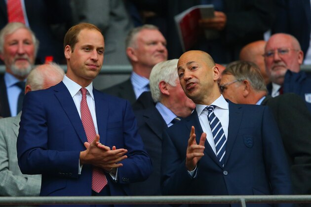 LONDON, ENGLAND - MAY 30:  Prince William, Duke of Cambridge speaks to Ivan Gazidis chief executive of Arsenal applaud during the international friendly match between England and Peru at Wembley Stadium on May 30, 2014 in London, England.  (Photo by Clive Rose/Getty Images)