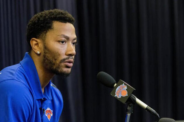 FILE - In this June 24, 2016, file photo, Derrick Rose speaks during a news conference for the New York Knicks to announce they acquired him from the Chicago Bulls at Madison Square Garden in New York. A Los Angeles federal judge ruled Tuesday, Sept. 20, that a woman accusing NBA star Rose of rape cannot remain anonymous at her upcoming civil trial. (AP Photo/Mary Altaffer, File)