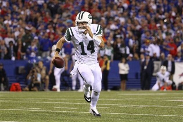 New York Jets quarterback Ryan Fitzpatrick (14) runs during the first half an NFL football game against the Buffalo Bills on Thursday, Sept. 15, 2016, in Orchard Park, N.Y. (AP Photo/Bill Wippert)