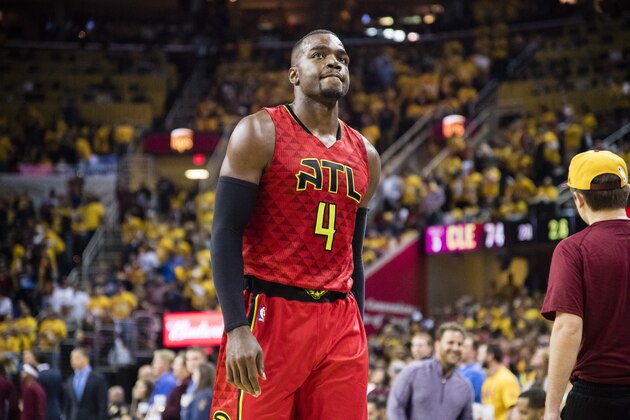 CLEVELAND, OH - MAY 4: Paul Millsap #4 of the Atlanta Hawks reacts after a play during the first half of the NBA Eastern Conference semifinals against the Cleveland Cavaliers at Quicken Loans Arena on May 4, 2016 in Cleveland, Ohio. NOTE TO USER: User expressly acknowledges and agrees that, by downloading and or using this photograph, User is consenting to the terms and conditions of the Getty Images License Agreement. (Photo by Jason Miller/Getty Images)