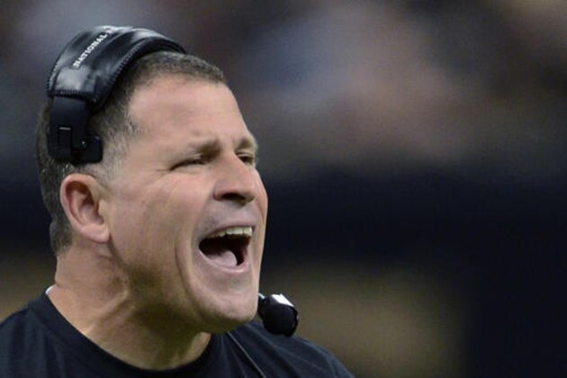 FILE - In this Dec. 29, 2013, file photo, then-Tampa Bay Buccaneers head coach Greg Schiano reacts on the sideline in the first half of an NFL football game against the New Orleans Saints, in New Orleans. Ohio State’s ball-hawking defense has given quarterbacks fits in the first two games against overmatched opponents. But it will be a different ballgame against Oklahoma. “Big boy football,” is how Ohio State defensive coordinator Greg Schiano put it. (AP Photo/Bill Feig, File)