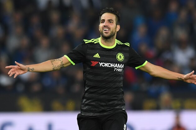 Chelsea's Spanish midfielder Cesc Fabregas celebrates scoring their fourth goal during extra-time in the English League Cup third round football match between Leicester City and Chelsea at King Power Stadium in Leicester, central England on September 20, 2016. / AFP / Anthony DEVLIN / RESTRICTED TO EDITORIAL USE. No use with unauthorized audio, video, data, fixture lists, club/league logos or 'live' services. Online in-match use limited to 75 images, no video emulation. No use in betting, games or single club/league/player publications.  /         (Photo credit should read ANTHONY DEVLIN/AFP/Getty Images)