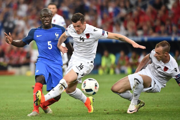 Albania's midfielder Taulant Xhaka (C) and France's midfielder N'Golo Kante (L) vie for the ball during the Euro 2016 group A football match between France and Albania at the Velodrome stadium in Marseille on June 15, 2016. / AFP / BERTRAND LANGLOIS        (Photo credit should read BERTRAND LANGLOIS/AFP/Getty Images)