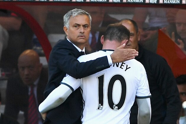 BOURNEMOUTH, ENGLAND - AUGUST 14:  Manager of Manchester United, Jose Mourinho hugs Wayne Rooney of Manchester United as he is substituted during the Premier League match between AFC Bournemouth and Manchester United at Vitality Stadium on August 14, 2016 in Bournemouth, England.  (Photo by Stu Forster/Getty Images)