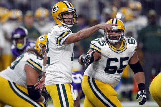 FILE - in this Sunday, Sept. 18, 2016, file photo, Green Bay Packers quarterback Aaron Rodgers (12) calls a play during the first half of an NFL football game against the Minnesota Vikings in Minneapolis. Green Bay’s struggling offense is looking to get its timing back when the Packers face the Detroit Lions in the home opener at Lambeau Field on Sunday.(AP Photo/Andy Clayton-King)