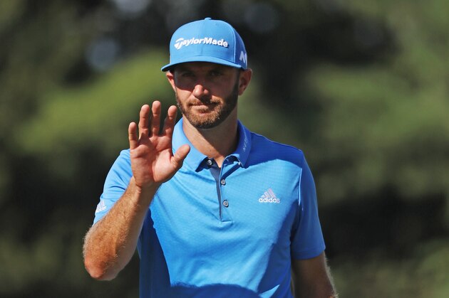 ATLANTA, GA - SEPTEMBER 23:  Dustin Johnson waves to the gallery on the 13th green during the second round of the TOUR Championship at East Lake Golf Club on September 23, 2016 in Atlanta, Georgia.  (Photo by Sam Greenwood/Getty Images)