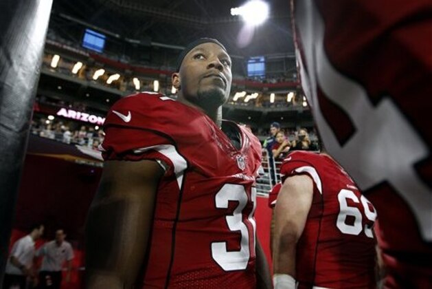 Arizona Cardinals running back David Johnson (31) exits the player tunnel with teammates before the start of an NFL preseason football game against the Oakland Raiders, Friday, Aug. 12, 2016, in Glendale, Ariz. (AP Photo/Ralph Freso)