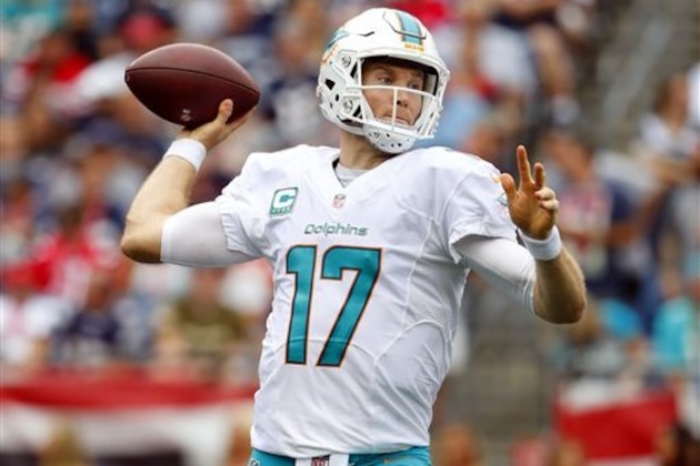 Miami Dolphins quarterback Ryan Tannehill throws during a NFL football game against the New England Patriots at Gillette Stadium in Foxborough, Mass. Sunday, Sept. 18, 2016. (Winslow Townson/AP Images for Panini)