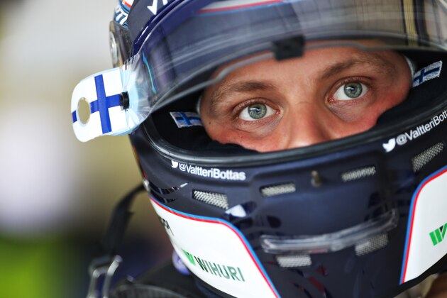 BUDAPEST, HUNGARY - JULY 23:  Valtteri Bottas of Finland and Williams in the garage during qualifying for the Formula One Grand Prix of Hungary at Hungaroring on July 23, 2016 in Budapest, Hungary.  (Photo by Mark Thompson/Getty Images)