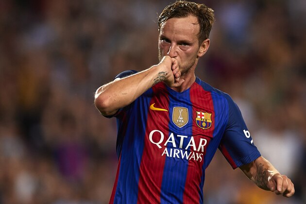 BARCELONA, SPAIN - SEPTEMBER 21:  Ivan Rakitic of FC Barcelona celebrates scoring his team's first goal during the La Liga match between FC Barcelona and Atletico de Madrid at Camp Nou stadium on September 21, 2016 in Barcelona, Spain.  (Photo by Manuel Queimadelos Alonso/Getty Images)