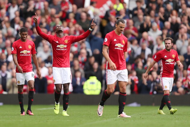 MANCHESTER, ENGLAND - SEPTEMBER 24: Paul Pogba of Manchester United celebrates after scoring a goal to make it 4-0 during the Premier League match between Manchester United and Leicester City at Old Trafford on September 24, 2016 in Manchester, England. (Photo by James Baylis - AMA/Getty Images)