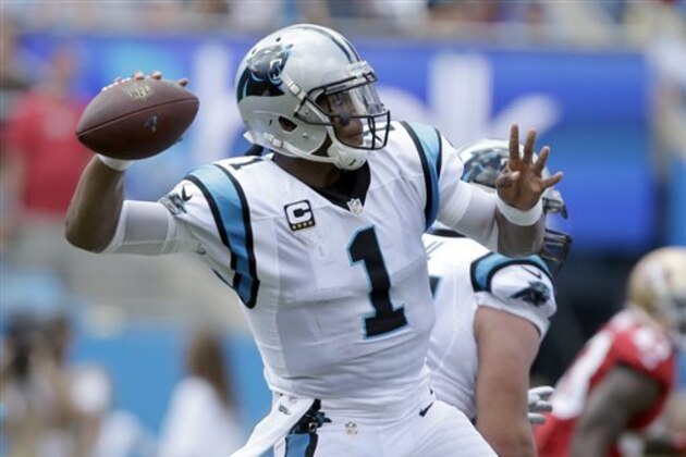 Carolina Panthers' Cam Newton (1) looks to pass against the San Francisco 49ers in the first half of an NFL football game in Charlotte, N.C., Sunday, Sept. 18, 2016. (AP Photo/Bob Leverone)