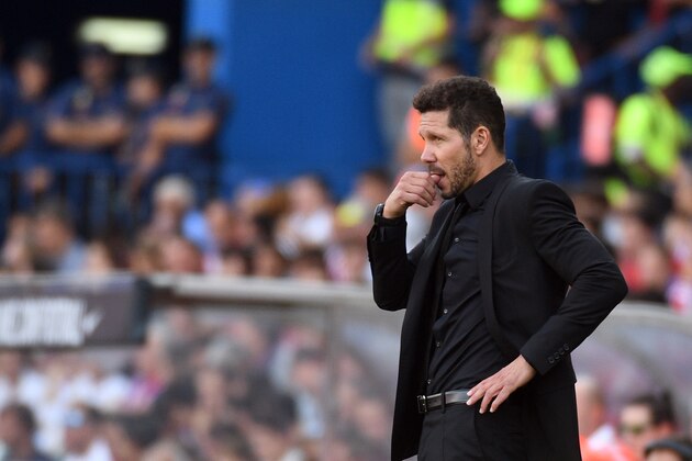 Atletico Madrid's Argentinian coach Diego Simeone gestures during the Spanish league football match Club Atletico de Madrid vs Real Sporting de Gijon at the Vicente Calderon stadium in Madrid on September 17, 2016. / AFP / GERARD JULIEN        (Photo credit should read GERARD JULIEN/AFP/Getty Images)