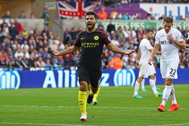 SWANSEA, WALES - SEPTEMBER 24: Sergio Aguero of Manchester City celebrates scoring his sides second goal  during the Premier League match between Swansea City and Manchester City at the Liberty Stadium on September 24, 2016 in Swansea, Wales.  (Photo by Michael Steele/Getty Images)