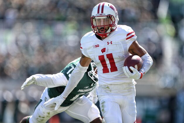 Sep 24, 2016; East Lansing, MI, USA;  Wisconsin Badgers wide receiver Jazz Peavy (11) runs for yards after a catch against the Michigan State Spartans during the first half of a game at Spartan Stadium. Mandatory Credit: Mike Carter-USA TODAY Sports