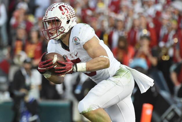 Jan 1, 2016; Pasadena, CA, USA; Stanford Cardinal running back Christian McCaffrey (5) runs against the Iowa Hawkeyes during the third quarter in the 2016 Rose Bowl at Rose Bowl. Mandatory Credit: Robert Hanashiro-USA TODAY Sports