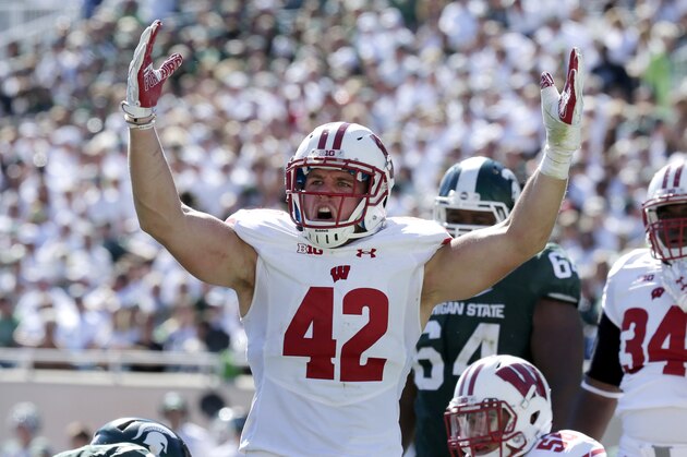 Sep 24, 2016; East Lansing, MI, USA;   Wisconsin linebacker T.J. Watt (42) reacts after a teammate sacked Michigan State quarterback Tyler O'Connor (not pictured) during the fourth their game at Spartan Stadium. Mandatory Credit: Mark Hoffman/Milwaukee Journal Sentinel via USA TODAY Sports