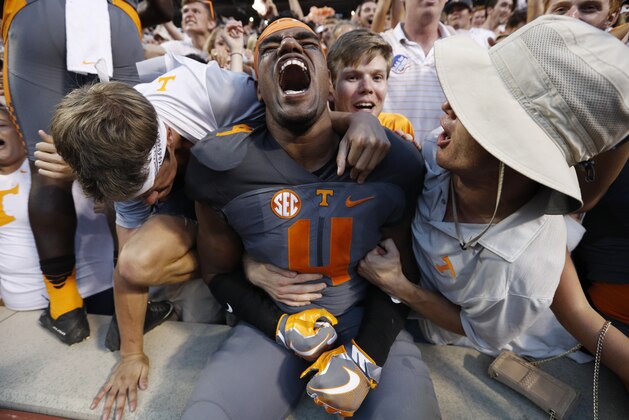 KNOXVILLE, TN - SEPTEMBER 24: LaTroy Lewis #4 of the Tennessee Volunteers celebrates with fans after the Vols defeated the Florida Gators 38-28 at Neyland Stadium on September 24, 2016 in Knoxville, Tennessee. (Photo by Joe Robbins/Getty Images)