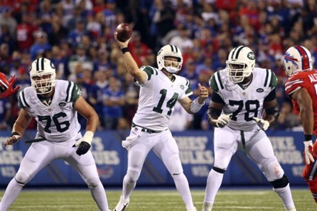 New York Jets quarterback Ryan Fitzpatrick (14) passes during the second half an NFL football game against the Buffalo Bills on Thursday, Sept. 15, 2016, in Orchard Park, N.Y. (AP Photo/Bill Wippert)