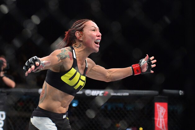 May 14, 2016; Curitiba, Brazil; Cris Justino (red) reacts after defending Leslie Smith (not pictured) during UFC Fight Night at Arena Atletico Paranaense. Mandatory Credit: Jason Silva-USA TODAY Sports