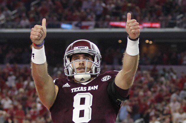 Sep 24, 2016; Dallas, TX, USA;  Texas A&M Aggies quarterback Trevor Knight (8) celebrates scoring a touchdown in the second quarter against the Arkansas Razorbacks at AT&T Stadium. Mandatory Credit: Tim Heitman-USA TODAY Sports