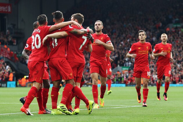 LIVERPOOL, ENGLAND - SEPTEMBER 24:  James Milner of Liverpool (7) celebrates scoring his sides second goal with team mates during the Premier League match between Liverpool and Hull City at Anfield on September 24, 2016 in Liverpool, England.  (Photo by Julian Finney/Getty Images)