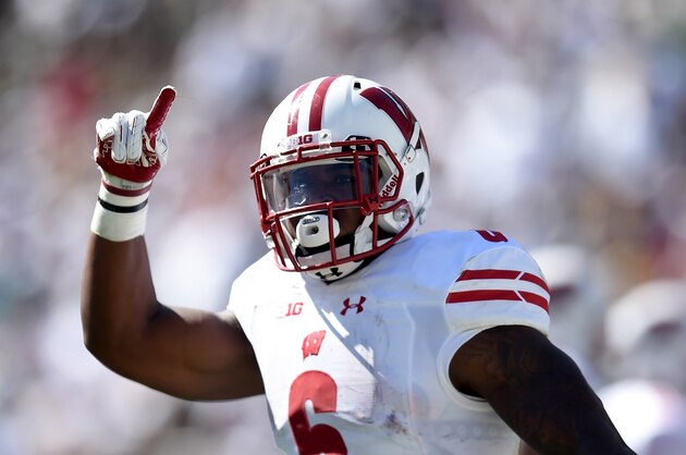 EAST LANSING, MI - SEPTEMBER 24:  Corey Clement #6 of the Wisconsin Badgers holds up a finger to the crowd after running for a touchdown during the game against the Michigan State Spartans at Spartan Stadium on September 24, 2016 in East Lansing, Michigan.  (Photo by Bobby Ellis/Getty Images)