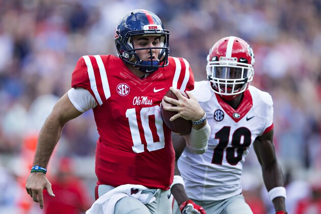 OXFORD, MS - SEPTEMBER 24:  Chad Kelly #10 of the Mississippi Rebels runs for a touchdown against Deandre Baker #18 of the Georgia Bulldogs at Vaught-Hemingway Stadium on September 24, 2016 in Oxford, Mississippi.  The Rebels defeated the Bulldogs 45-14.  (Photo by Wesley Hitt/Getty Images)