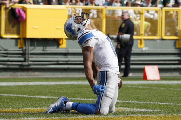 Detroit Lions' Marvin Jones celebrates his touchdown catch during the second half of an NFL football game against the Green Bay Packers Sunday, Sept. 25, 2016, in Green Bay, Wis. (AP Photo/Mike Roemer)