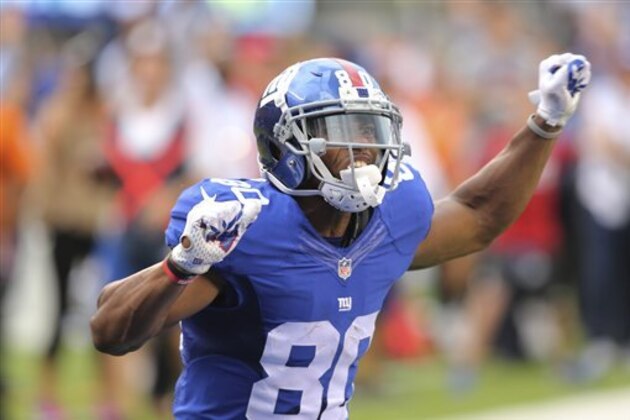 New York Giants wide receiver Victor Cruz (80) celebrates after making a catch during the second half of an NFL football game against the New Orleans Saints Sunday, Sept. 18, 2016, in East Rutherford, N.J. The Giants won 16-13. (AP Photo/Seth Wenig)