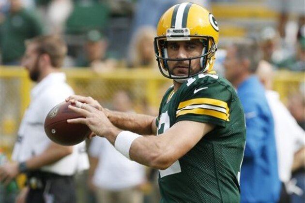 Green Bay Packers quarterback Aaron Rodgers warms up before an NFL football game against the Detroit Lions Sunday, Sept. 25, 2016, in Green Bay, Wis. (AP Photo/Mike Roemer)