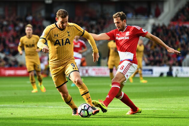 MIDDLESBROUGH, ENGLAND - SEPTEMBER 24:  Vincent Janssen of Tottenham Hotspur (L) is tackled by Cristhian Stuani of Middlesbrough (R) during the Premier League match between Middlesbrough and Tottenham Hotspur at the Riverside Stadium on September 24, 2016 in Middlesbrough, England.  (Photo by Dan Mullan/Getty Images)