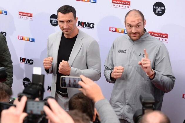 Ukrainian boxer Wladimir Klitschko (L) and British heavyweight world champion Tyson Fury pose for photographers during a press conference in Cologne, western Germany, on April 28, 2016, where they talked about their re-match-fight for the title to take place on July 9, 2016 in Manchester, Great Britain.
Hamburg-based Klitschko lost his WBA, IBF, IBO and WBO belts to Britain's Fury on points in Duesseldorf in November 2015 as the Ukrainian suffered his first defeat in more than a decade. / AFP / Roberto Pfeil        (Photo credit should read ROBERTO PFEIL/AFP/Getty Images)