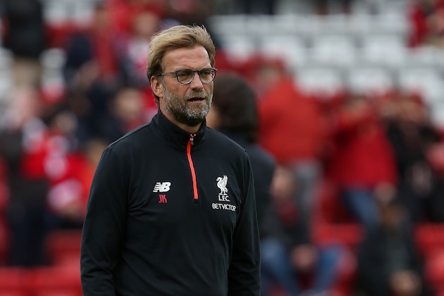 Liverpool's German manager Jurgen Klopp watches his players warm up ahead of the English Premier League football match between Liverpool and Hull City at Anfield in Liverpool, north west England on September 24, 2016. / AFP / GEOFF CADDICK / RESTRICTED TO EDITORIAL USE. No use with unauthorized audio, video, data, fixture lists, club/league logos or 'live' services. Online in-match use limited to 75 images, no video emulation. No use in betting, games or single club/league/player publications.  /         (Photo credit should read GEOFF CADDICK/AFP/Getty Images)
