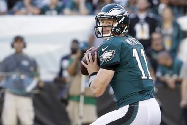 Philadelphia Eagles quarterback Carson Wentz (11) in action during the first half of the NFL football game against the Pittsburgh Steelers, Sunday, Sept. 25, 2016, in Philadelphia. The Eagles won 34-3. (AP Photo/Chris Szagola)