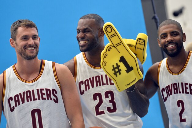 Sep 26, 2016; Cleveland, OH, USA; Cleveland Cavaliers forward Kevin Love (0), forward LeBron James (23) and guard Kyrie Irving (2) laugh during a photo session during media day at Cleveland Clinic Courts. Mandatory Credit: Ken Blaze-USA TODAY Sports