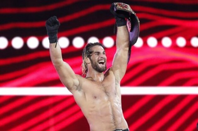 WWE Superstar Seth Rollins celebrates becoming the new WWE World Heavyweight Champion at WrestleMania 31 at Levi's Stadium on Sunday, March 29, 2015 in Santa Clara, CA. WrestleMania broke the Levi’s Stadium attendance record at 76,976 fans from all 50 states and 40 countries. (Don Feria/AP Images for WWE)