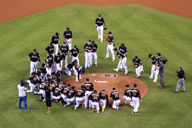 MIAMI, FL - SEPTEMBER 26: Miami Marlins players all wearing jerseys bearing the number 16 and name Fernandez honor the late Jose Fernandez before the game against the New York Mets at Marlins Park on September 26, 2016 in Miami, Florida. (Photo by Rob Foldy/Getty Images)