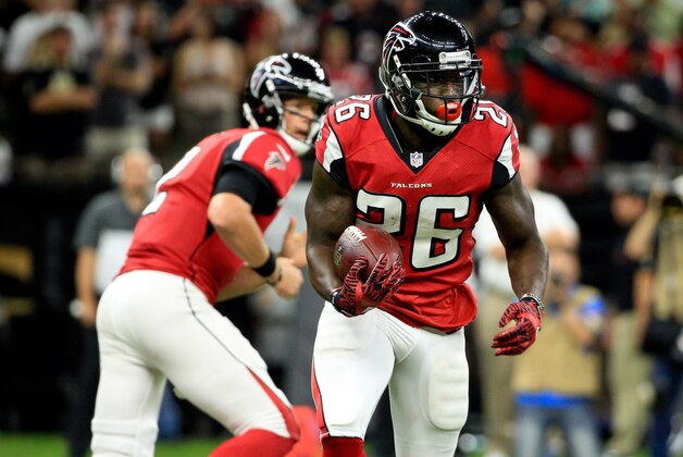 Sep 26, 2016; New Orleans, LA, USA; Atlanta Falcons running back Tevin Coleman (26) runs against the New Orleans Saints during the first quarter of a game at the Mercedes-Benz Superdome. Mandatory Credit: Derick E. Hingle-USA TODAY Sports