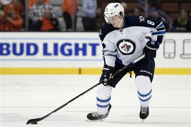 Winnipeg Jets defenseman Jacob Trouba (8) in action during the first period of an NHL hockey game against the Anaheim Ducks in Anaheim, Calif., Tuesday, April 5, 2016. (AP Photo/Kelvin Kuo)