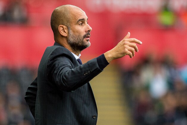 SWANSEA, WALES - SEPTEMBER 24: Manager of Manchester City, Josep Guardiola reacts during the Premier League match between Swansea City and Manchester City at The Liberty Stadium on September 24, 2016 in Swansea, Wales. (Photo by Athena Pictures/Getty Images)
