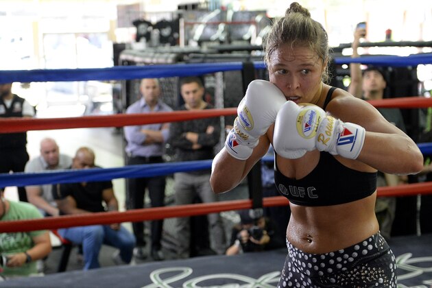 GLENDALE, CA - JULY 15:  Former boxer Mike Tyson and UFC president Dana White watch UFC Bantamweight champion Ronda Rousey during a media training session at the Glendale Fight Club on July 15, 2015 in Glendale, California.  (Photo by Robert Laberge/Zuffa LLC/Zuffa LLC via Getty Images)