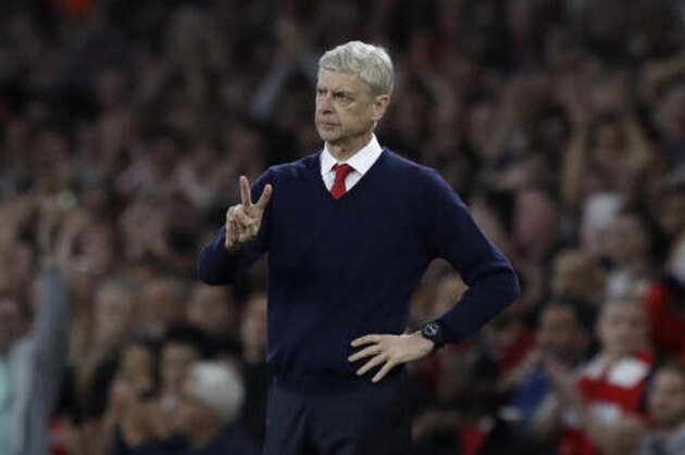 Arsenal team manager Arsene Wenger gestures during the English Premier League soccer match between Arsenal and Chelsea at the Emirates Stadium in London, Saturday, Sept. 24, 2016. (AP Photo/Matt Dunham)