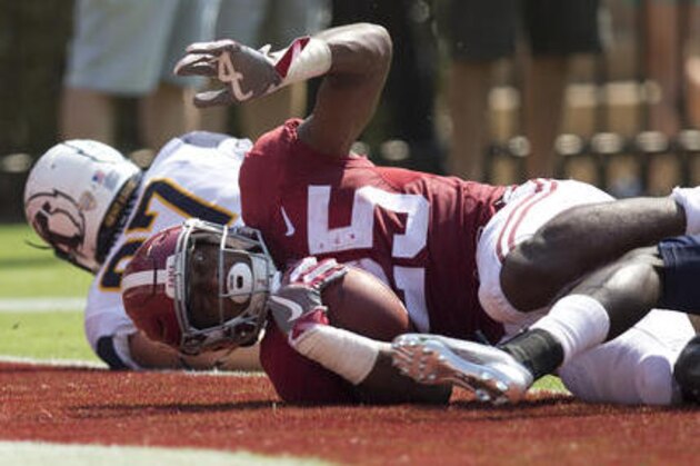 Alabama running back Joshua Jacobs scores a touchdown in the first half during an NCAA college football game against Kent State, Saturday, Sept. 24, 2016, in Tuscaloosa, Ala. (AP Photo/Brynn Anderson)
