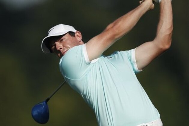Rory McIlroy hits from the tee on the 16th hole during the final round of play at the Tour Championship golf tournament at East Lake Golf Club  Sunday, Sept. 25, 2016, in Atlanta. (AP Photo/John Bazemore)