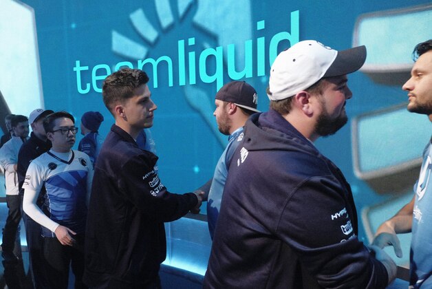 May 24, 2016; Atlanta, GA, USA; Luminosity shake hands with Team Liquid after their victory over in the final match of day one round robin play during day one of ELEAGUE round robin play at Turner Studios. Mandatory Credit: Jeremy Freeman/Turner Sports via USA TODAY Sports