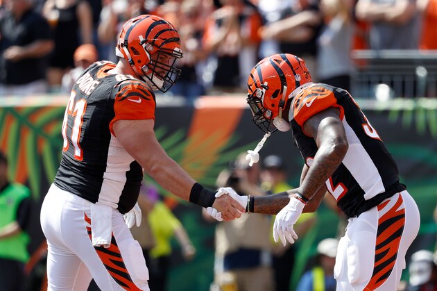 CINCINNATI, OH - SEPTEMBER 25:  Russell Bodine #61 of the Cincinnati Bengals congratulates Jeremy Hill #32 of the Cincinnati Bengals after scoring a touchdown during the first quarter of the game against the Denver Broncos at Paul Brown Stadium on September 25, 2016 in Cincinnati, Ohio. (Photo by Joe Robbins/Getty Images)
