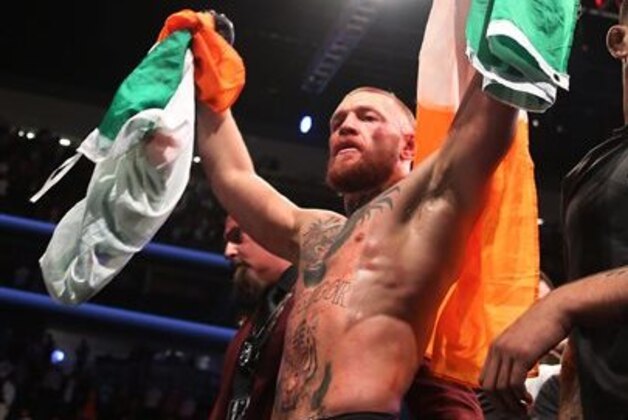 Conor McGregor celebrates after defeating Nate Diaz in a welterweight mixed martial arts bout at UFC 202 on Saturday, Aug. 20, 2016, in Las Vegas. (AP Photo/Isaac Brekken)