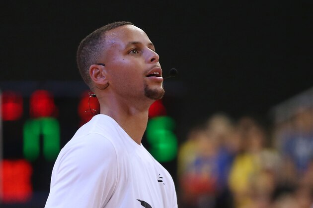 GUANGZHOU, CHINA - SEPTEMBER 03:  American professional basketball NBA player Stephen Curry of the Golden State Warriors attends a commercial event for Under Armour at Asian Games Stadium on September 3, 2016 in Guangzhou, China.  (Photo by Zhong Zhi/Getty Images)
